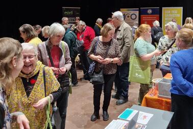 People at mini-fairs.