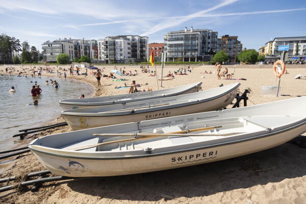 City rowing boats delighting sea tourists in Helsinki for the